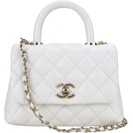 Chanel Coco Handle Extra Mini Caviar Bag in luxurious caviar leather, available at Luxury LD.